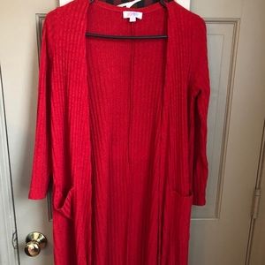 Small red Sarah lulaRoe (not stretchy)